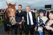 29 July 2016; Trainer Tony Martin alongside jockey Leigh Roche after sending out Golden Spear to win the Guinness Handicap at the Galway Races in Ballybrit, Co Galway. Photo by Cody Glenn/Sportsfile