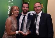 29 July 2016; Darragh O'Reilly  is presented with the Noel O'Reilly Coach of the year award from Rose McAllorum and Republic of Ireland manager Martin O'Neill, at the FAI Media Awards at The Hotel Minella in Clonmel, Co Tipperary Photo by David Maher/Sportsfile