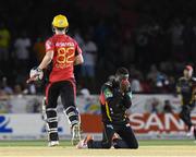 29 July 2016;  Jonathan Carter (R) of St Kitts and Nevis Patriots disappointed as he missfields Colin Munro (L) of Trinbago Knight Riders during Match 26 of the Hero Caribbean Premier League match between St Kitts and Nevis Patriots and Trinbago Knight Riders at Central Broward Stadium in Lauderhill, Florida, United States of America. Photo by Randy Brooks/Sportsfile