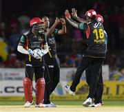 29 July 2016;  Samuel Badree (2L) of St Kitts and Nevis Patriots celebrates the dismissal of Denesh Ramdin of Trinbago Knight Riders during Match 26 of the Hero Caribbean Premier League match between St Kitts and Nevis Patriots and Trinbago Knight Riders at Central Broward Stadium in Lauderhill, Florida, United States of America. Photo by Randy Brooks/Sportsfile