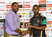 29 July 2016;  Evin Lewis (R) of St Kitts receives the player of the match prize from Dave Cameron (L) president of West Indies Cricket Board at the end of Match 26 of the Hero Caribbean Premier League match between St Kitts and Nevis Patriots and Trinbago Knight Riders at Central Broward Stadium in Lauderhill, Florida, United States of America. Photo by Randy Brooks/Sportsfile