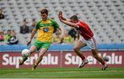 30 July 2016; Nathan O'Donnell of Donegal in action against Alan McCarthy of Cork during the Electric Ireland GAA Football All-Ireland Minor Championship Quarter-Final match between Donegal and Cork at Croke Park in Dublin. Photo by Oliver McVeigh/Sportsfile