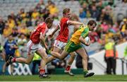 30 July 2016; Aidan McLaughlin of Donegal in action against Liam O'Donovan and Sean O'Sullivan of Cork during the Electric Ireland GAA Football All-Ireland Minor Championship Quarter-Final match between Donegal and Cork at Croke Park in Dublin. Photo by Oliver McVeigh/Sportsfile