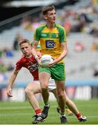 30 July 2016; Jason McGee of Donegal in action against Liam O'Donnovan of Cork during the Electric Ireland GAA Football All-Ireland Minor Championship Quarter-Final match between Donegal and Cork at Croke Park in Dublin. Photo by Oliver McVeigh/Sportsfile