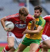 30 July 2016; Ian Maguire of Cork in action against Odhrán MacNiallais of Donegal during the GAA Football All-Ireland Senior Championship Round 4B match between Donegal and Cork at Croke Park in Dublin.