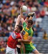 30 July 2016; Peter Kelleher of Cork in action against Eamonn McGee and Mark Anthony McGinley of Donegal during the GAA Football All-Ireland Senior Championship Round 4B match between Donegal and Cork at Croke Park in Dublin. Photo by Ray McManus/Sportsfile