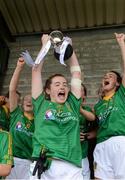30 July 2016; Marion Farrelly of Meath lifting the cup after the All Ireland Ladies Football Minor ‘B’ Championship Final 2016 match between Meath and Roscommon at St Loman's in Mullingar, Co Westmeath. Photo by Eóin Noonan/Sportsfile