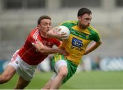 30 July 2016; Martin McElhinney of Donegal in action against Mark Collins of Cork during the GAA Football All-Ireland Senior Championship Round 4B match between Donegal and Cork at Croke Park in Dublin. Photo by Oliver McVeigh/Sportsfile