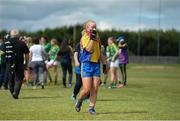 30 July 2016; A dejected Sinéad Farrell of Roscommon makes her way off the pitch after the All Ireland Ladies Football Minor ‘B’ Championship Final 2016 match between Meath and Roscommon at St Loman's in Mullingar, Co Westmeath. Photo by Eóin Noonan/Sportsfile