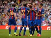 30 July 2016; Arda Turan, facing, of Barcelona is congratulated by teammates after scoring his team's opening goal during the International Champions Cup match between Glasgow Celtic and Barcelona at the Aviva Stadium in Dublin. Photo by Seb Daly/Sportsfile