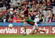 30 July 2016; Brendan Harrison of Mayo makes a block against Dean McNicholas of Westmeath during the GAA Football All-Ireland Senior Championship Round 4B match between Westmeath and Mayo at Croke Park in Dublin. Photo by Oliver McVeigh/Sportsfile