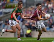30 July 2016; James Dolan of Westmeath has his jersey pulled by Kevin Keane of Mayo as he bursts through the Mayo defence to score a first half goal during the GAA Football All-Ireland Senior Championship Round 4B match between Westmeath and Mayo at Croke Park in Dublin. Photo by Ray McManus/Sportsfile