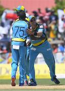 30 July 2016; Michael Hussey (R) and Jerome Taylor (L) of St Lucia Zouks celebrate the dismissal of Alex Ross of Jamaica Tallawah during Match 27 of the Hero Caribbean Premier League match between St Lucia Zouks and Jamaica Tallawahs at Central Broward Stadium in Lauderhill, Florida, United States of America. Photo by Randy Brooks/Sportsfile