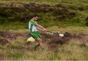 30 July 2016; James McInerney of Clare hits the winning shot during the M Donnelly All-Ireland Poc Fada in the Annaverna Mountain, Ravensdale, Co Louth. Photo by Piaras Ó Mídheach/Sportsfile