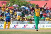 30 July 2016; Ahmed Shahzad (L) of Barbados Tridents is dismissed by Dwayne Smith (R) of Guyana Amazon Warriors during the Hero Caribbean Premier League (CPL) Match 28 between Barbados Tridents and  Guyana Amazon Warriors at Central Broward Stadium in Fort Lauderdale, Florida, USA. Photo by Ashley Allen/Sportsfile