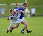 26 September 2010; Mark Battersby, Skryne, in action against Gerry Sheridan, Seneschalstown. Meath County Senior Football Championship Final, Skryne v Seneschalstown, Pairc Tailteann, Navan, Co. Meath. Picture credit: Brian Lawless / SPORTSFILE