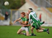 26 September 2010; Noel Gaughan, Tourlestranes, in action against Paul McGovern and Michael Doddy, 12, Eastern Harps. Sligo County Senior Football Championship Final, Eastern Harps v Tourlestrane, Markievicz Park, Sligo. Picture credit: David Maher / SPORTSFILE