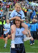 26 September 2010; Claire Kennedy, Dublin, celebrates with her eight year old daughter Josline after the game. TG4 All-Ireland Senior Ladies Football Championship Final, Dublin v Tyrone, Croke Park, Dublin. Picture credit: Dáire Brennan / SPORTSFILE