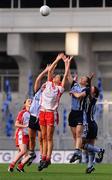 26 September 2010; Denise Masterson, right, and Siobhán McGrath, Dublin, contest a high ball with Sarah Donnelly, Tyrone. TG4 All-Ireland Senior Ladies Football Championship Final, Dublin v Tyrone, Croke Park, Dublin. Picture credit: Dáire Brennan / SPORTSFILE