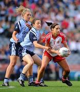 26 September 2010; Sarah Donnelly, Tyrone, in action against Denise Masterson, right, and Amy McGuinness, Dublin. TG4 All-Ireland Senior Ladies Football Championship Final, Dublin v Tyrone, Croke Park, Dublin. Picture credit: Dáire Brennan / SPORTSFILE