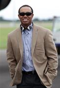 27 September 2010; Tiger Woods in relaxed mood as the USA team arrives at Cardiff Airport ahead of the 39th annual Ryder Cup. Cardiff Airport, Wales. Picture credit: Ryder Cup Europe / SPORTSFILE