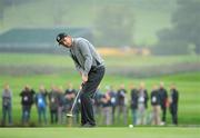 28 September 2010; Padraig Harrington watches his putt on the 12th green. 2010 Ryder Cup - Practice Day, The Celtic Manor Resort, City of Newport, Wales. Picture credit: Matt Browne / SPORTSFILE