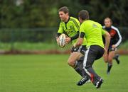 28 September 2010; Munster's Ronan O'Gara, left, in action against team-mate Scott Deasy during squad training ahead of their Celtic League match against Leinster on Saturday. Cork Institute of Technology, Bishopstown, Cork. Picture credit: Barry Cregg / SPORTSFILE