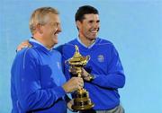 29 September 2010; Padraig Harrington with team captain Colin Montgomerie during the team photo shoot. 2010 Ryder Cup - Practice Day, The Celtic Manor Resort, City of Newport, Wales. Picture credit: Matt Browne / SPORTSFILE