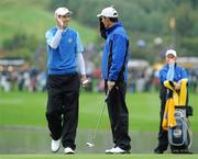 29 September 2010; Padraig Harrington, right, congratulates his playing partner Ross Fisher, Team Europe, after his birdie on the 6th green. 2010 Ryder Cup - Practice Day, The Celtic Manor Resort, City of Newport, Wales. Picture credit: Matt Browne / SPORTSFILE