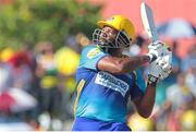 30 July 2016; Kieron Pollard captain of Barbados Tridents plays a pull-shot for six during the Hero Caribbean Premier League (CPL) Match 28 between Barbados Tridents and  Guyana Amazon Warriors at Central Broward Stadium in Fort Lauderdale, Florida, USA. Photo by Ashley Allen/Sportsfile