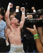 Jul 30 2016; Carl Frampton of Northern Ireland celebrates his victory over Leo Santa Cruz of Mexico after their WBA super world featherweight championship boxing match at the Barclays Center, Brooklyn, New York, USA. Photo by Noah K. Murray/Sportsfile