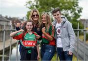 30 July 2016; Mayo supporters, left to right, Caitlin Coogan, aged 11, Anne-Marie Coogan, Shannon Coogan, and Mark Devanny, from Kilmovee, Co Mayo, ahead of the GAA Football All-Ireland Senior Championship Round 4B match between Westmeath and Mayo at Croke Park in Dublin. Photo by Daire Brennan/Sportsfile