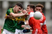 31 July 2016; Ferdia O'Brien of Kerry in action against Shea Downey and Eoghan Concannon, behind, both of Derry, during the Electric Ireland GAA Football All-Ireland Minor Championship Quarter-Final match between Kerry and Derry at Croke Park in Dublin. Photo by Piaras Ó Mídheach/Sportsfile