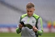 31 July 2016; Peter Crowley of Kerry reads the programme on the pitch prior to the GAA Football All-Ireland Senior Championship Quarter-Final match between Clare and Kerry at Croke Park in Dublin. Photo by Piaras Ó Mídheach/Sportsfile