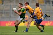31 July 2016; David Moran of Kerry in action against Cathal O'Connor and Seán Collins, right, of Clare during the GAA Football All-Ireland Senior Championship Quarter-Final match between Clare and Kerry at Croke Park in Dublin. Photo by Piaras Ó Mídheach/Sportsfile