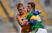 31 July 2016; Pearse Lillis of Clare tussles for the ball against David Moran of Kerry during the GAA Football All-Ireland Senior Championship Quarter-Final match between Clare and Kerry at Croke Park in Dublin. Photo by Piaras Ó Mídheach/Sportsfile