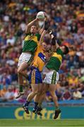 31 July 2016; Shane Enright of Kerry catches the ball under pressure from his team mate Brian Ó Beaglaoich and Pearse Lillis of Clare during the GAA Football All-Ireland Senior Championship Quarter-Final match between Clare and Kerry at Croke Park in Dublin. Photo by Ray McManus/Sportsfile