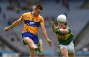 31 July 2016; Jamie Malone of Clare kicks a point under pressure from Tadhg Morley of Kerry during the GAA Football All-Ireland Senior Championship Quarter-Final match between Clare and Kerry at Croke Park in Dublin. Photo by Ray McManus/Sportsfile