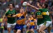 31 July 2016; Pádraic Collins of Clare in action against Shane Enright, 2, Brian Ó Beaglaoich and Killian Young of Kerry during the GAA Football All-Ireland Senior Championship Quarter-Final match between Clare and Kerry  at Croke Park in Dublin. Photo by Ray McManus/Sportsfile