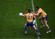 31 July 2016; James O'Donoghue of Kerry in action against Shane Hickey, left, and Eoin Cleary of Clare during the GAA Football All-Ireland Senior Championship Quarter-Final match between Clare and Kerry at Croke Park in Dublin. Photo by Daire Brennan/Sportsfile
