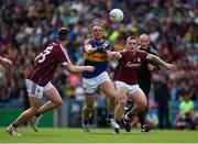 31 July 2016; Peter Acheson of Tipperary in action against Eamon Brennigan, 13, and Liam Silke of Galway during the GAA Football All-Ireland Senior Championship Quarter-Final match between Galway and Tipperary at Croke Park in Dublin. Photo by Ray McManus/Sportsfile