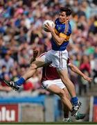 31 July 2016; Ciarán McDonald of Tipperary in action against Damien Comer of Galway during the GAA Football All-Ireland Senior Championship Quarter-Final match between Galway and Tipperary at Croke Park in Dublin. Photo by Piaras Ó Mídheach/Sportsfile