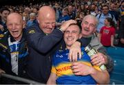 31 July 2016; Kevin O’Halloran of Tipperary celebrates with his dad Tim and friends Paddy Russell, left, and Tom Ryan, right, after the GAA Football All-Ireland Senior Championship Quarter-Final match between Galway and Tipperary at Croke Park in Dublin. Photo by Ray McManus/Sportsfile