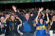 31 July 2016; Tipperary supporters in the Hogan Stand celebrate after the GAA Football All-Ireland Senior Championship Quarter-Final match between Galway and Tipperary at Croke Park in Dublin. Photo by Ray McManus/Sportsfile