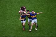 31 July 2016; Tipperary players, left to right, Philip Austin, Martin Dunne, and Kevin O'Halloran, celebrate after the GAA Football All-Ireland Senior Championship Quarter-Final match between Galway and Tipperary at Croke Park in Dublin. Photo by Daire Brennan/Sportsfile