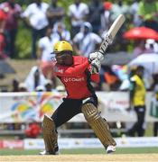 31 July 2016; William Perkins of Trinbago Knight Riders hits 4 during Match 29 of the Hero Caribbean Premier League match between Trinbago Knight Riders and St Kitts and Nevis Patriots at Central Broward Stadium in Lauderhill, Florida, United States of America. Photo by Randy Brooks/Sportsfile.