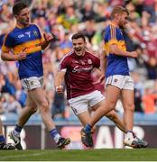 31 July 2016; Damien Comer of Galway celebrates scoring his side's first goal as Tipperary's Jimmy Feehan, left, and Colm O’Shaughnessy look on during the GAA Football All-Ireland Senior Championship Quarter-Final match between Galway and Tipperary at Croke Park in Dublin. Photo by Piaras Ó Mídheach/Sportsfile