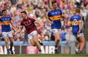 31 July 2016; Damien Comer of Galway celebrates scoring his side's first goal as Tipperary's, from left, Ciarán Mc Donald, Jimmy Feehan, and Colm O’Shaughnessy look on during the GAA Football All-Ireland Senior Championship Quarter-Final match between Galway and Tipperary at Croke Park in Dublin. Photo by Piaras Ó Mídheach/Sportsfile