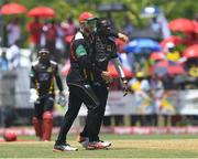 31 July 2016;  Faf du Plessis (L) and Jonathan Carter (R) of St Kitts and Nevis Patriots celebrate the dismissal of William Perkins of Trinbago Knight Riders during Match 29 of the Hero Caribbean Premier League match between Trinbago Knight Riders and St Kitts and Nevis Patriots at Central Broward Stadium in Lauderhill, Florida, United States of America. Photo by Randy Brooks/Sportsfile.