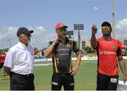31 July 2016;  Dwayne Bravo (R) of Trinbago Knight Riders as Faf du Plessis (C) of St Kitts and Nevis Patriots and match referee Dev Govindjee (L) look on at the start of Match 29 of the Hero Caribbean Premier League match between Trinbago Knight Riders and St Kitts and Nevis Patriots at Central Broward Stadium in Lauderhill, Florida, United States of America. Photo by Randy Brooks/Sportsfile.